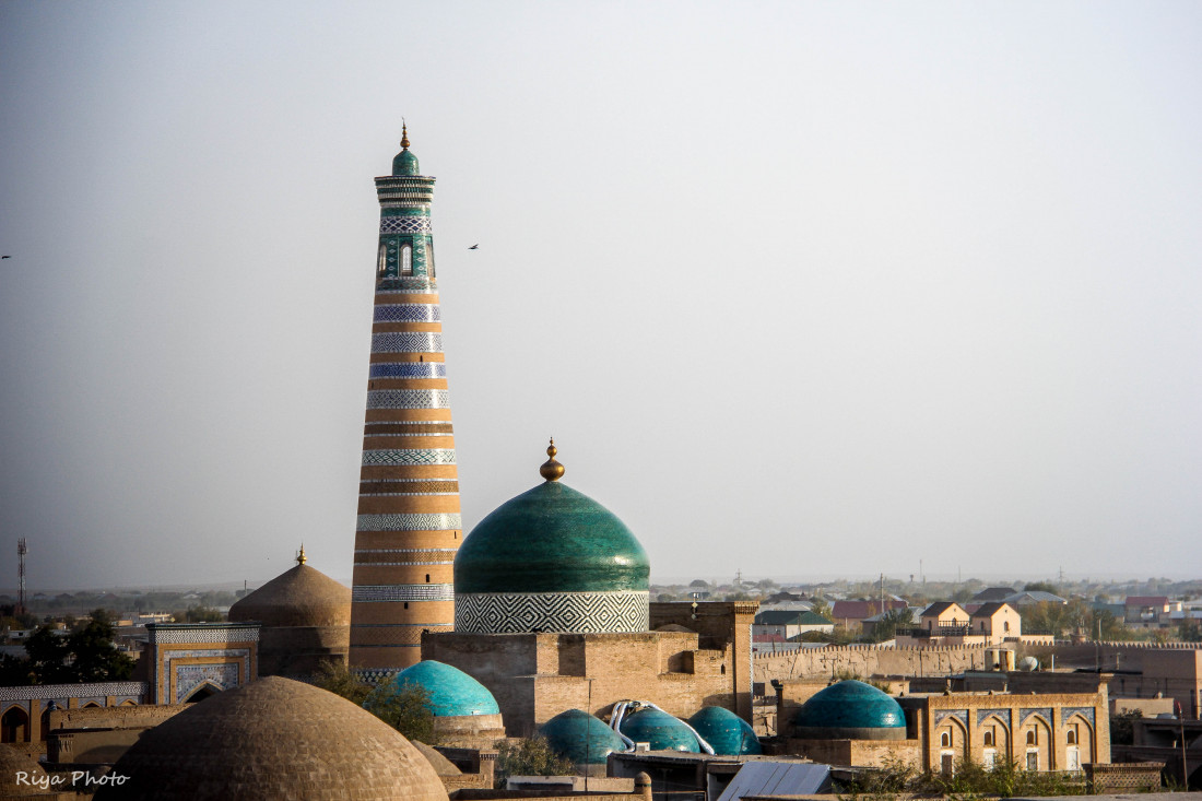 The towering, tapered Islam Khoja Minaret rising against the sky in Khiva