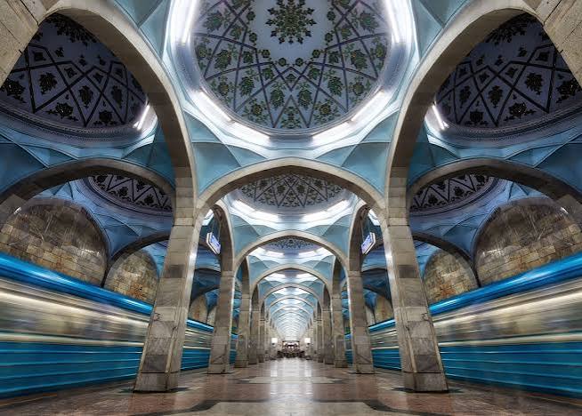 Marble columns and vaulted decorative ceiling of a Tashkent Metro underground station